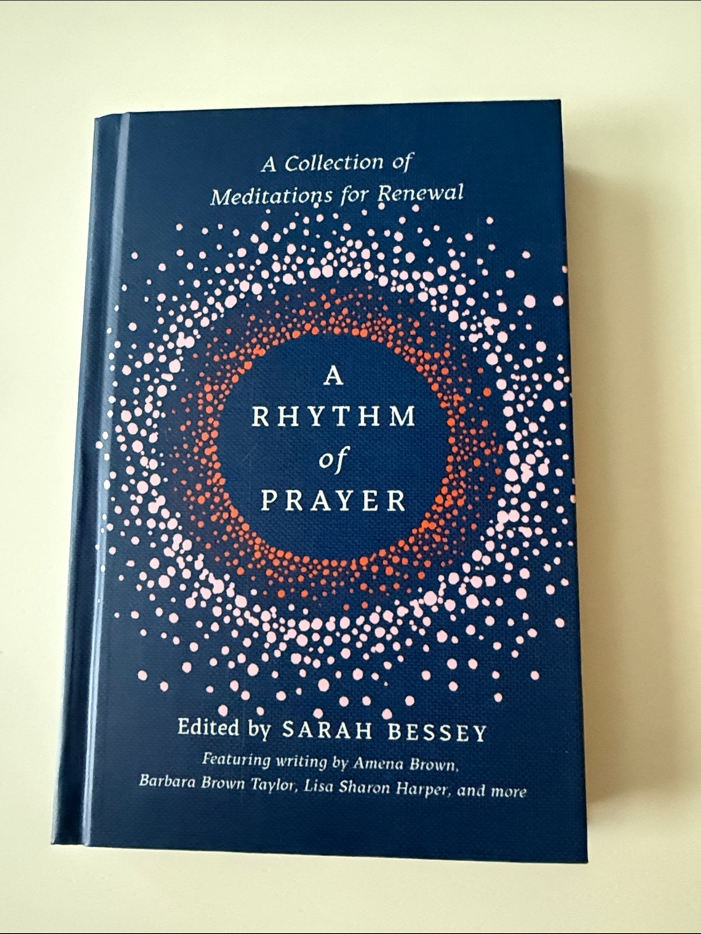 A Rhythm of Prayer — Navy Hardcover Book with Pink & Coral Dot Design